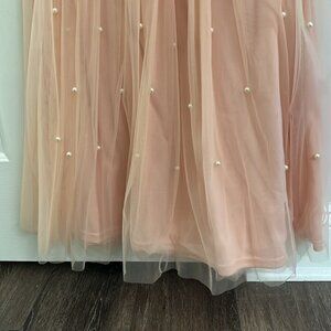 Light pink skirt with pearl flounce twirl and have fun
